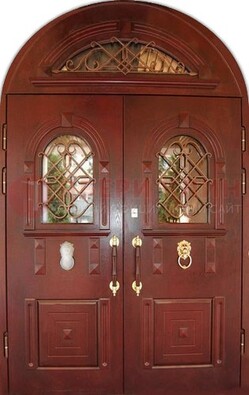 Стальная арочная дверь со стеклом и ковкой ДА-30 в дом из кирпича в Перми