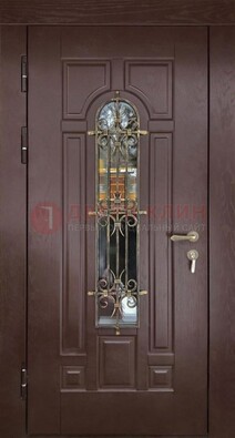 Темная железная дверь со стеклом и ковкой для частного дома ДСК-156 в Перми