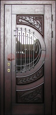 Одностворчатая входная дверь со стеклом и ковкой ДСК-21 в Перми