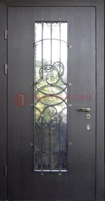 Остекленная стальная дверь с ковкой ДСК-26 в Перми
